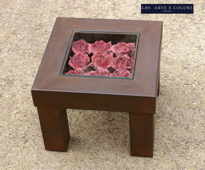 Wrought iron coffee table with glass shelf. Roses